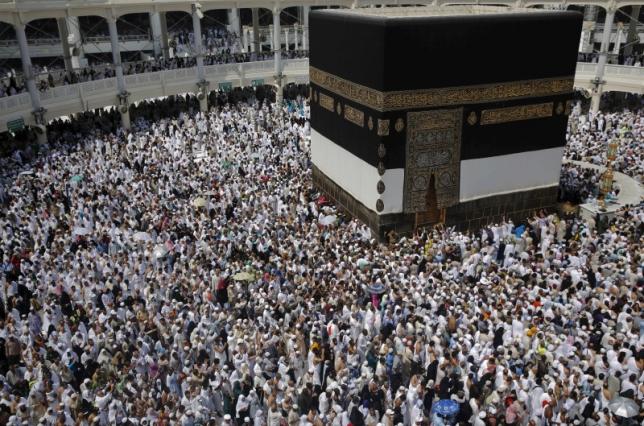 Muslim pilgrims pray around the holy Kaaba at the Grand Mosque ahead of the annual haj pilgrimage in Mecca
